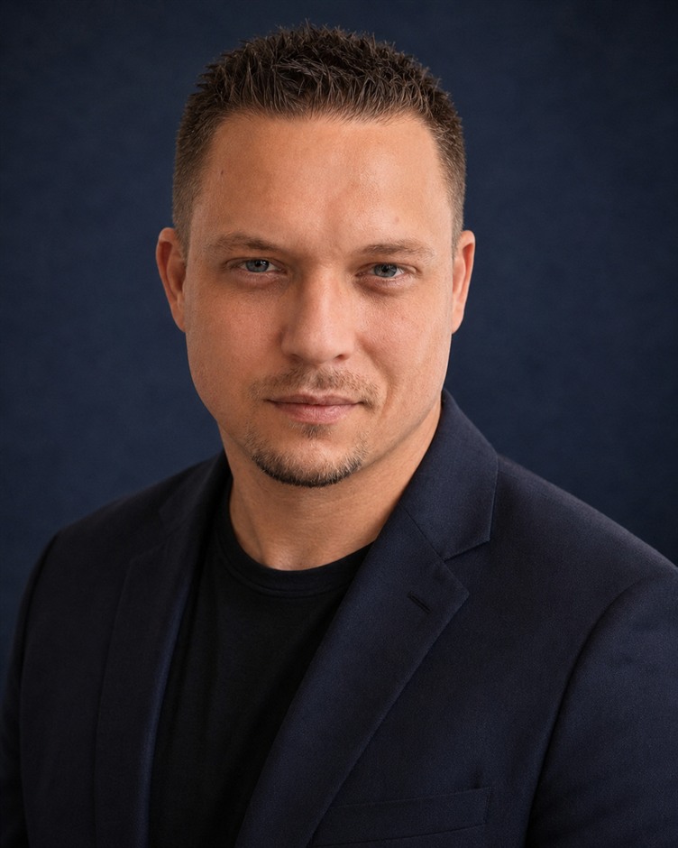 Professional portrait of Kris Kozma